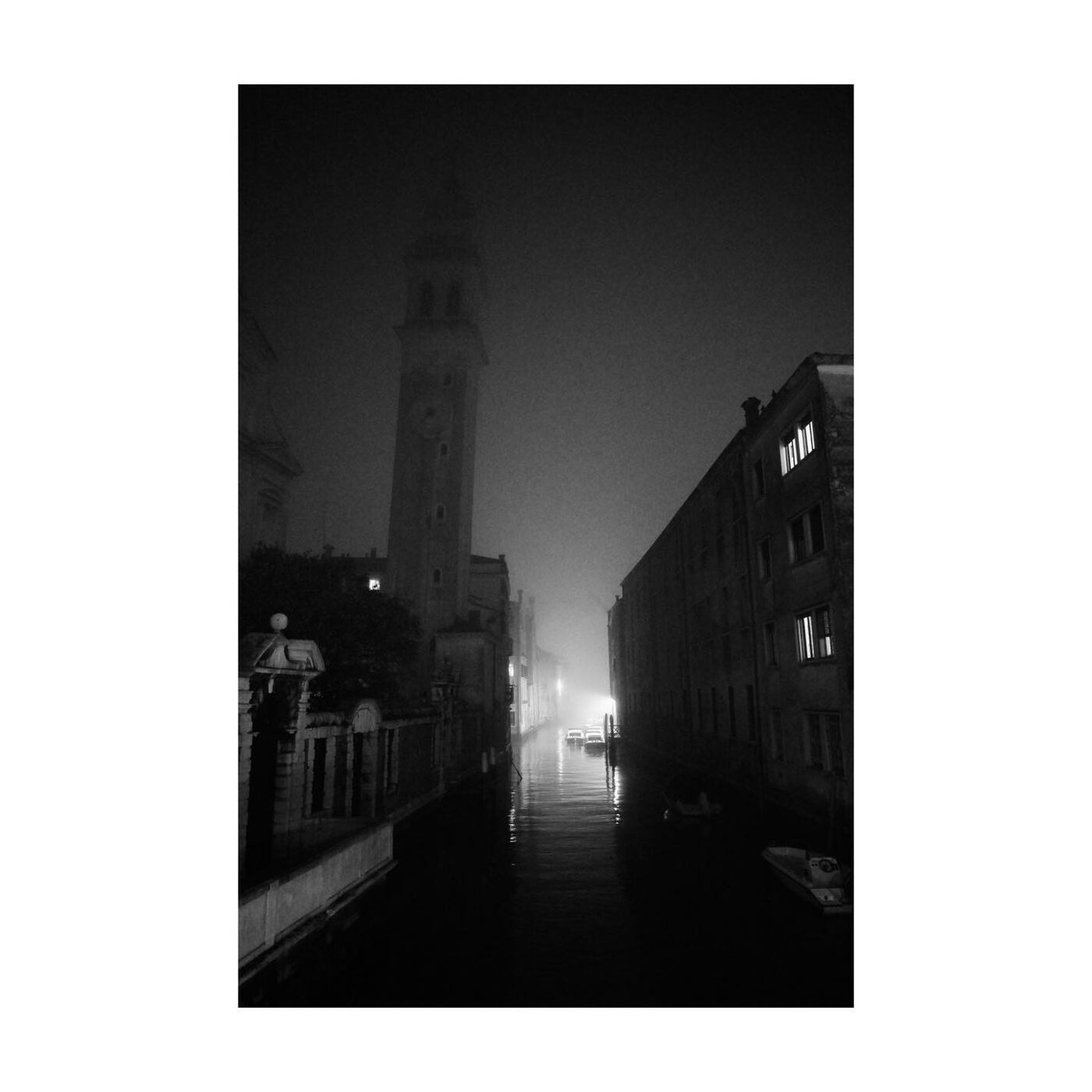 A bridge disappearing into fog